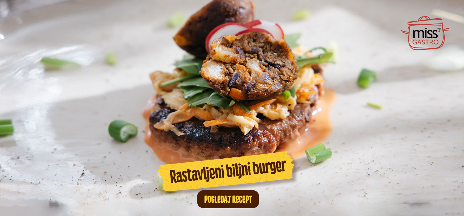 Rastavljeni biljni burger serviran na tanjuru